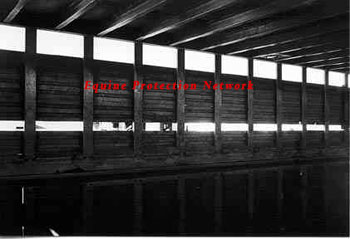 The above photo shows the 3 inch metal "I" beams that support the top deck of the trailer. These beams protrude below the ceiling of the bottom deck. The beams are on 12 inch centers.